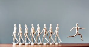 introvert breaking away from the crowd