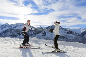 Woman having ski lesson on mountain
