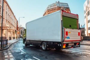 Delivery truck on curb in city
