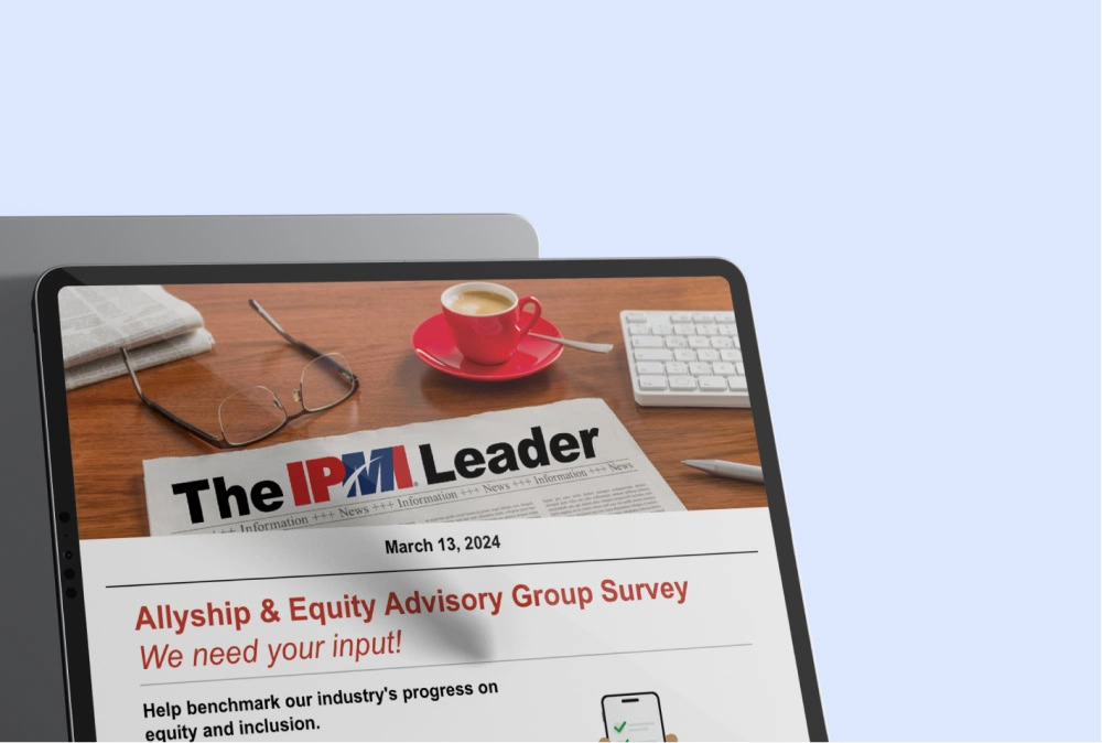 Tablet with the International Parking and Mobility Institute newsletter showing Allyship & Equity Advisory Group Survey