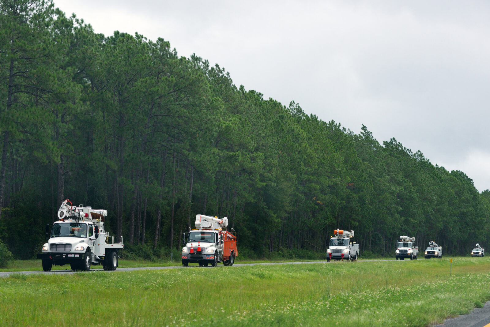 Hurricane Irma Strikes United States. A convoy of utility trucks speed along Interstate 75 in Georgia to assist the thousands who lost power in the aftermath of Hurricane Irma.