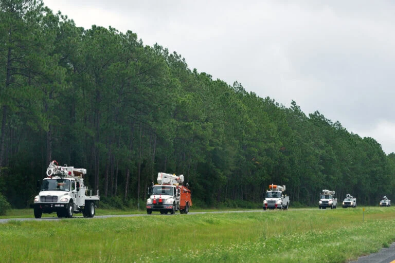Hurricane Irma Strikes United States. A convoy of utility trucks speed along Interstate 75 in Georgia to assist the thousands who lost power in the aftermath of Hurricane Irma.