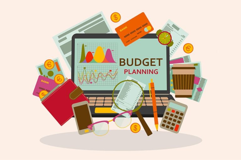 Stock graphic of many tools used for budget planning, including mobile phone, calculator. credit cards, and a cup of coffee