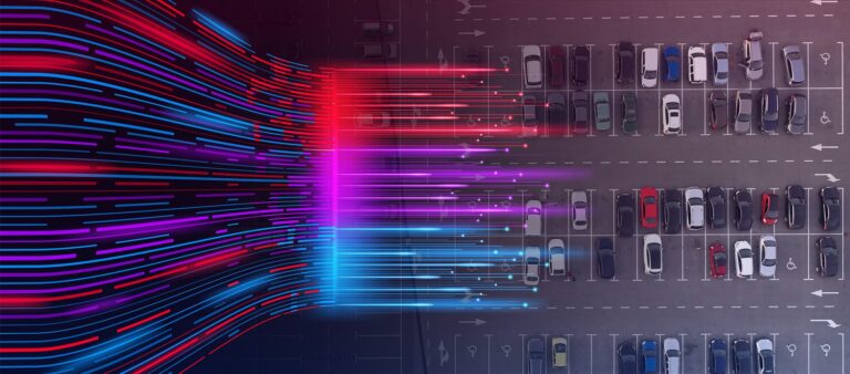 Aerial shot of cars parked in a parking lot with colorful networking background