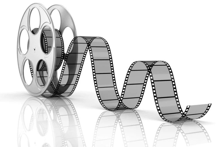 Film roll partially unrolled showing film strip