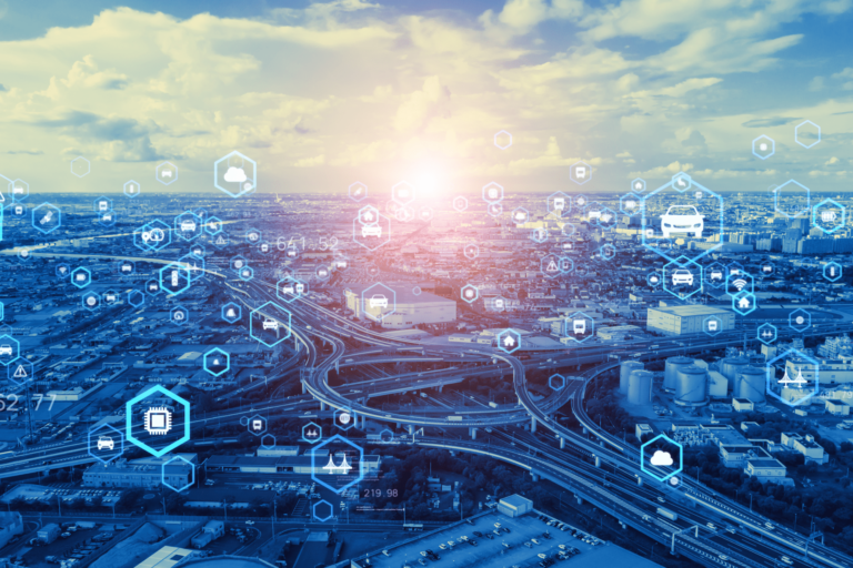 Blue aerial shot of highway system with hexagon icons