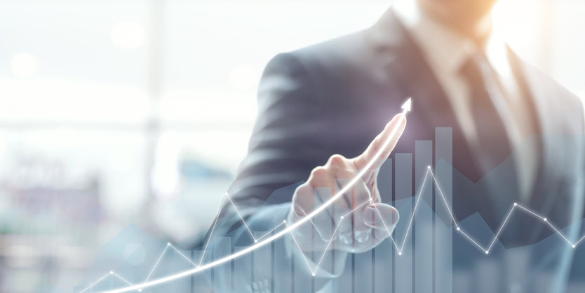 Businessman plans growth and increases of positive indicators in his business.