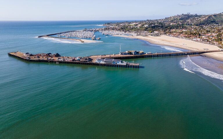 Aerial photo of a wharf and harbor and crystal clear water