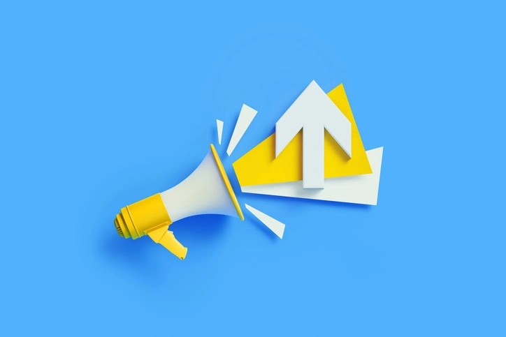 Up arrow symbol coming out from a yellow megaphone on blue background.