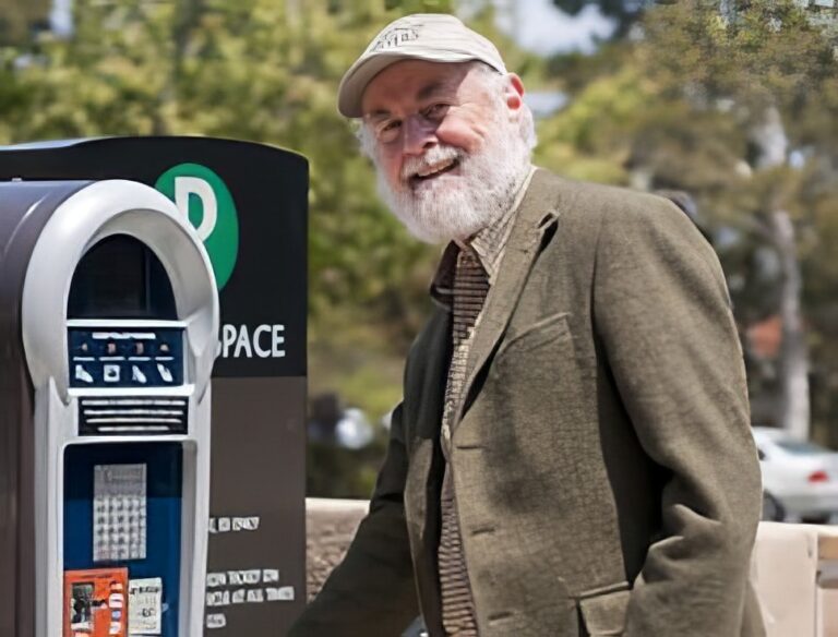 Older gentleman at a parking kiosk